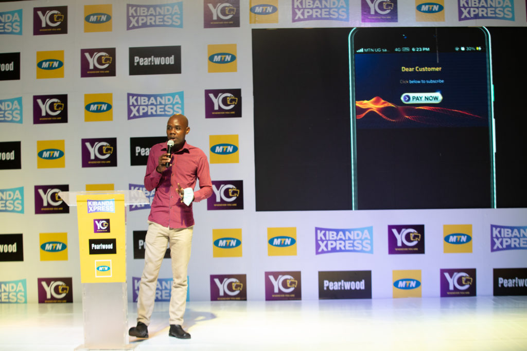 MTN's Onyait Odeke took the audience through the Kibanda Xpress user journey