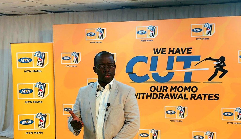Stephen Mutana while addressing the press at the MoMo withdrawal price cut press conference (1)